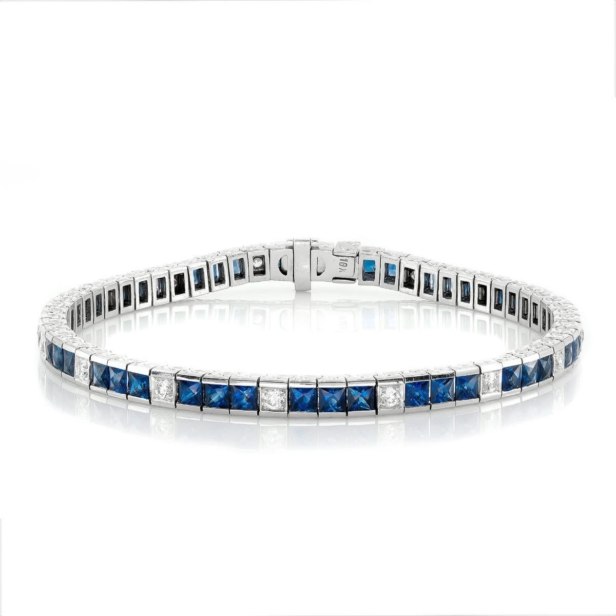 Discover the timeless allure of this natural blue sapphire bracelet, featuring a total of 7.52 carats of vibrant princess-cut sapphires set in luxurious 18K white gold. Accented by 0.72 carats of sparkling diamonds, this bracelet embodies