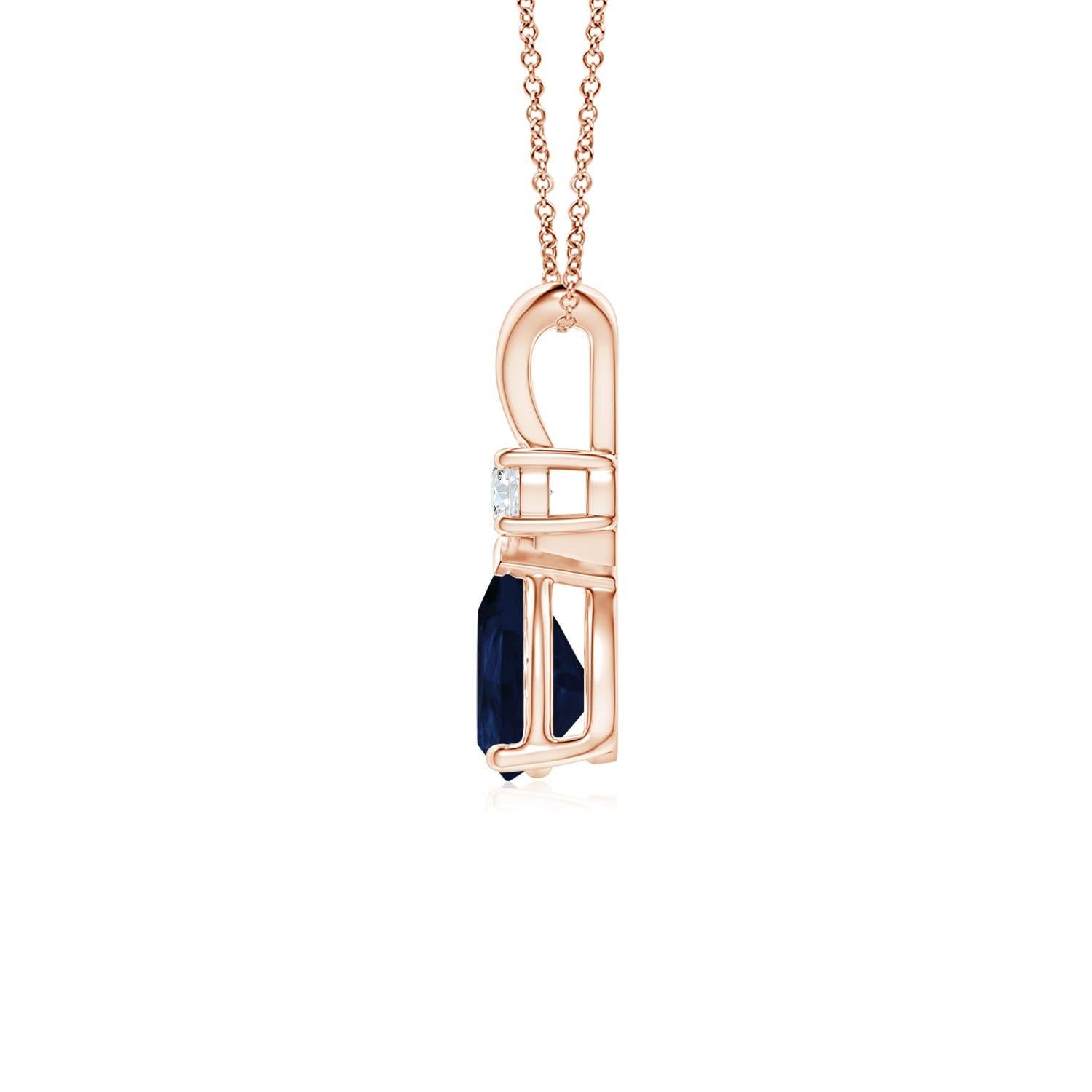 This classic solitaire pendant features a pear-shaped sapphire secured in a prong setting. A brilliant round diamond sits atop the blue gemstone adding to the design's charm. Simple yet appealing, this sapphire pendant in 14k rose gold is crafted