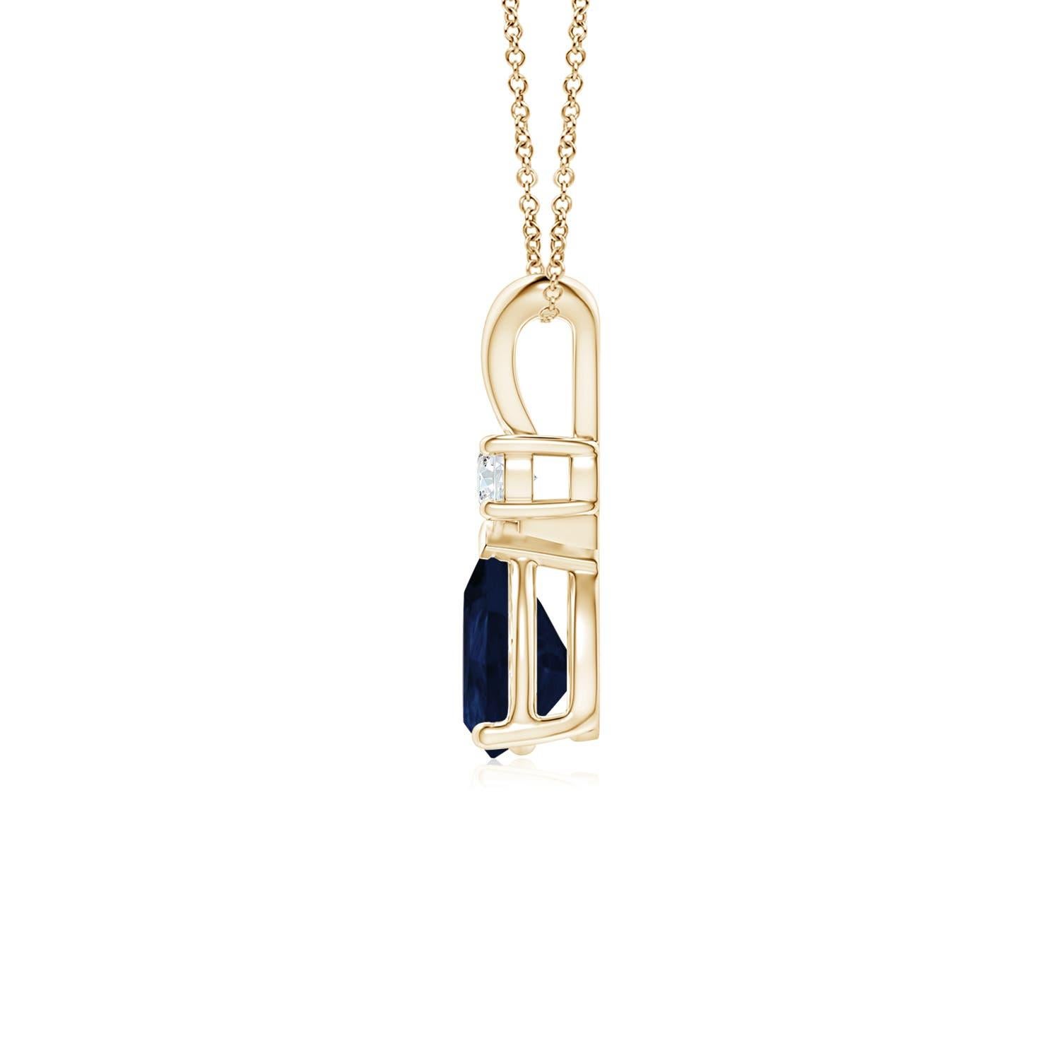 This classic solitaire pendant features a pear-shaped sapphire secured in a prong setting. A brilliant round diamond sits atop the blue gemstone adding to the design's charm. Simple yet appealing, this sapphire pendant in 14k yellow gold is crafted