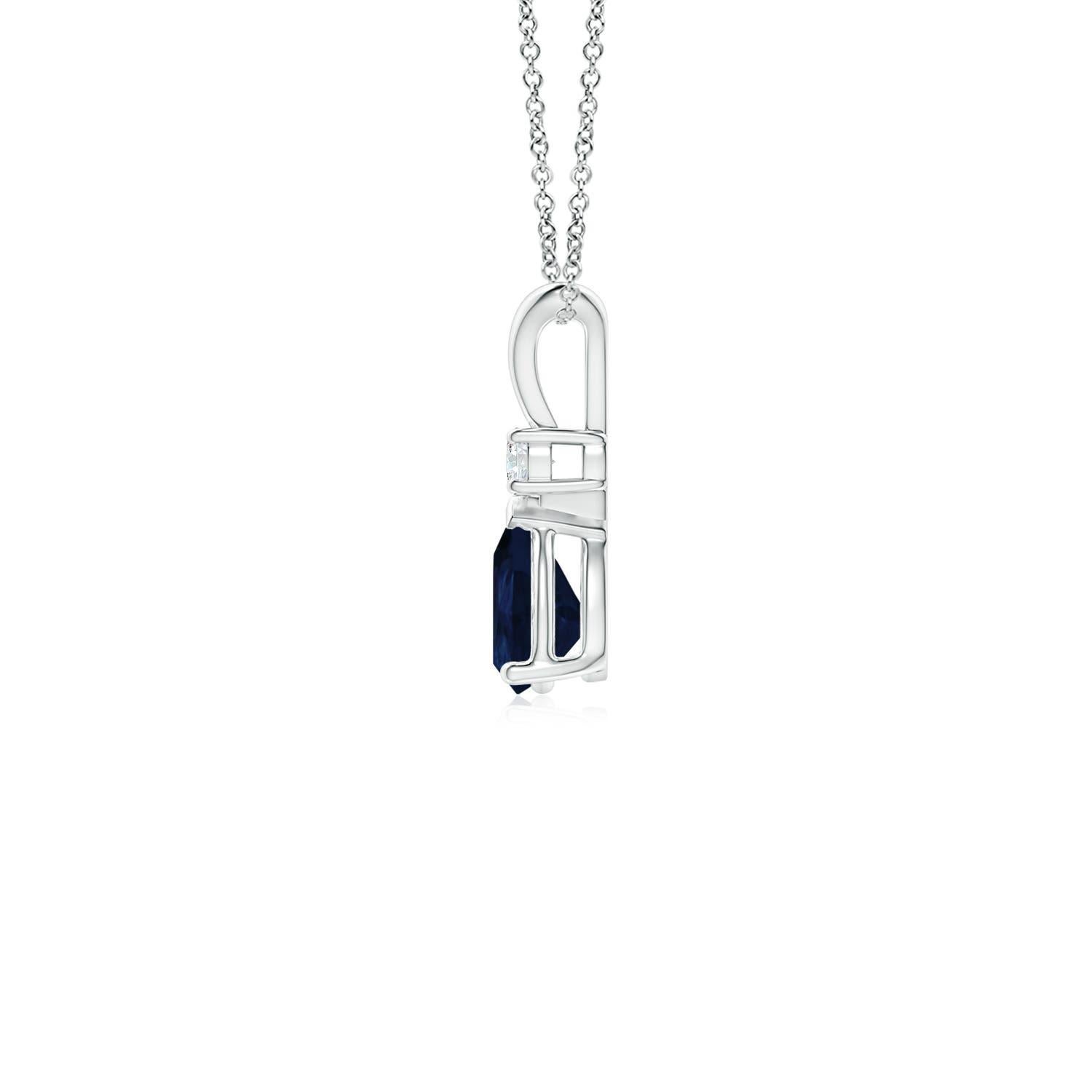 This classic solitaire pendant features a pear-shaped sapphire secured in a prong setting. A brilliant round diamond sits atop the blue gemstone adding to the design's charm. Simple yet appealing, this sapphire pendant in 18k white gold is crafted