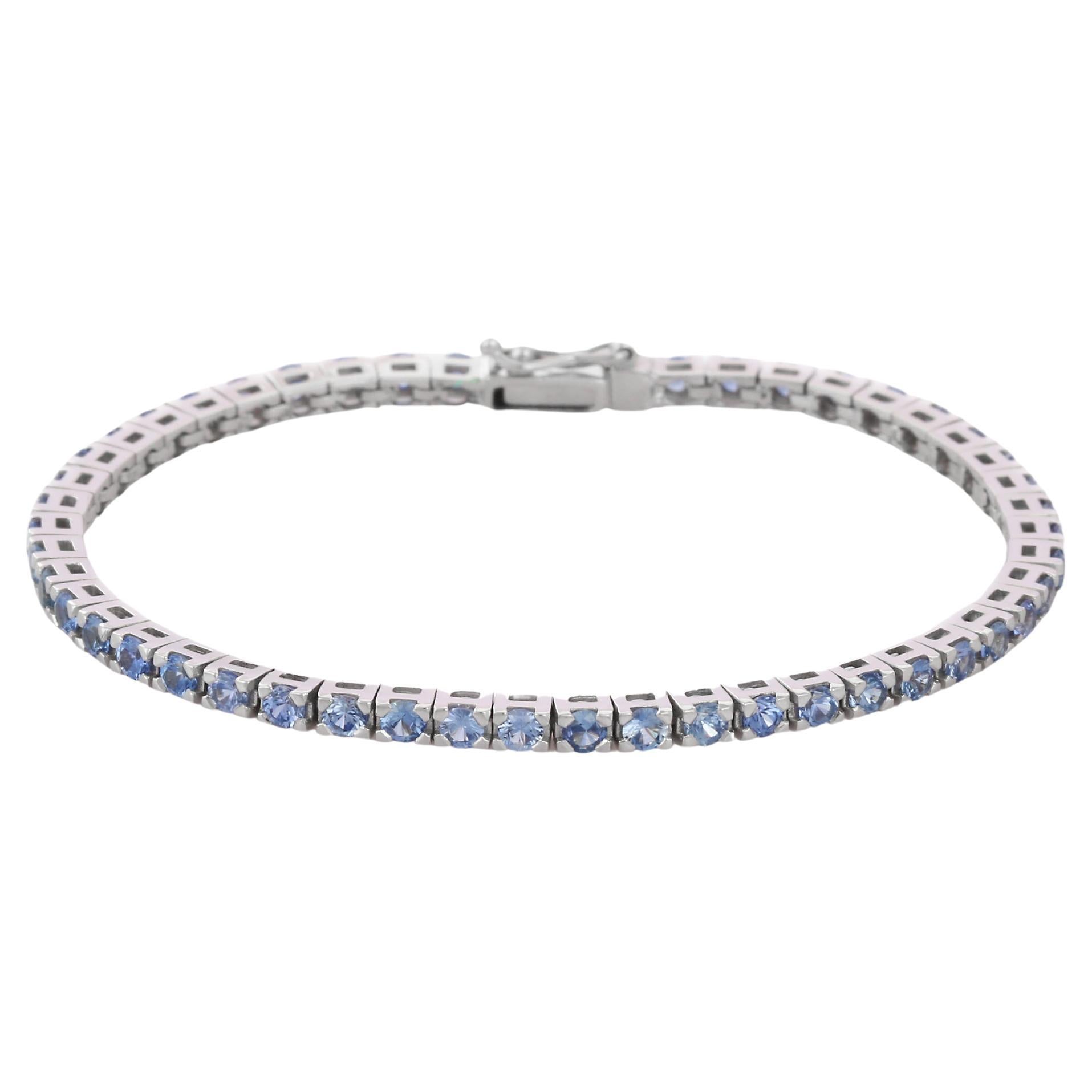 Natural Blue Sapphire Tennis Bracelet in 18K Gold For Sale