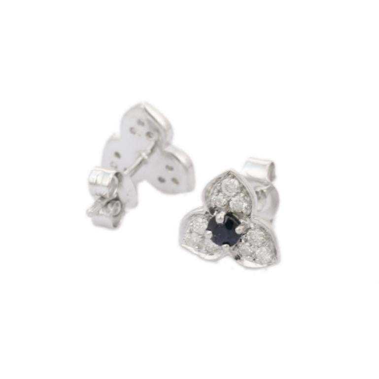 These gorgeous Natural Blue Sapphire Diamond Trillium Flower Stud Earrings are crafted from the finest material and adorned with dazzling blue sapphire gemstone where blue sapphire enhances intuition and promotes mental clarity.
These studs earring
