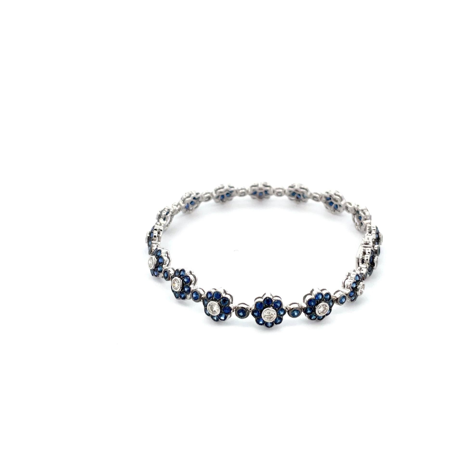 A gorgeous flower bracelet in 18kt white gold with natural blue sapphires and brilliant cut diamonds. An elegant casual look for everyday.

144 natural pink sapphires weighing 5.00ct total weight

16 brilliant cut diamonds weighing 1.43ct total
