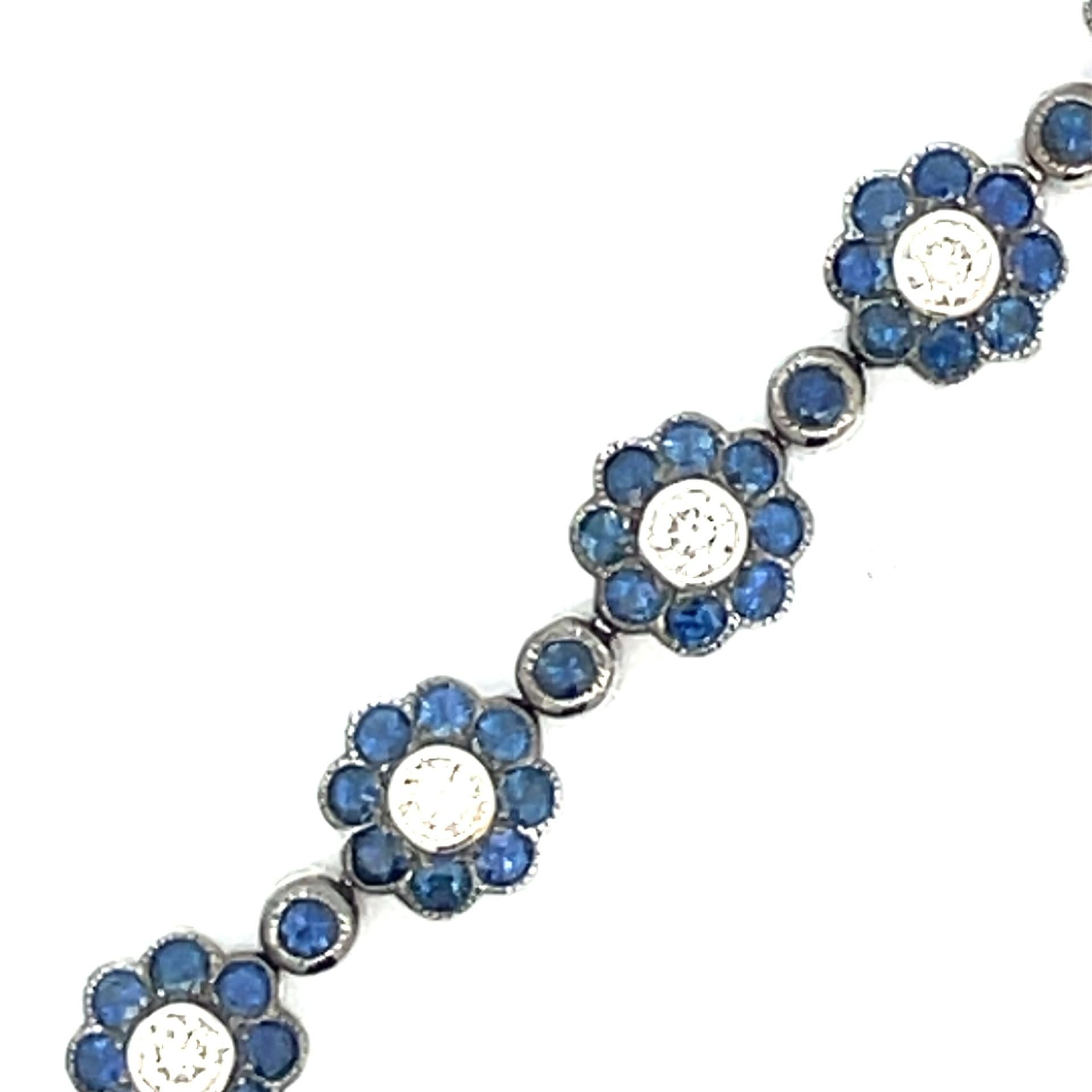 Round Cut Natural Blue Sapphire & White Diamond Flower Bracelet in 18 Karat White Gold For Sale