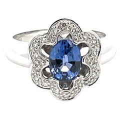 Natural Blue Sapphire & White Diamond Flower Solitaire Ring in 18Kt White Gold