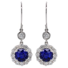 Natural Blue Sapphires 2.24 Carats set in 18K White Gold Earrings with Diamonds