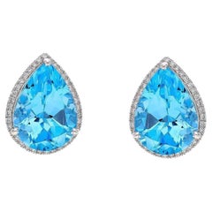 Orecchino con topazio blu naturale da 9,20 carati e diamante da 0,19 carati in oro 14k