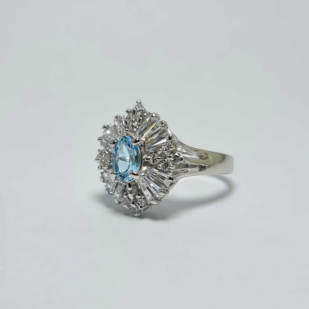 Natural Blue Topaz Cubic Zirconia set in pure.925 Sterling Silver Rhodium plated Ring 