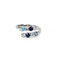 Offener Ring mit natürlichem blauem Topas und blauem Saphir