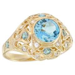 Blue Topaz and Diamond Vintage Style Dome Ring in Solid 9K Yellow Gold