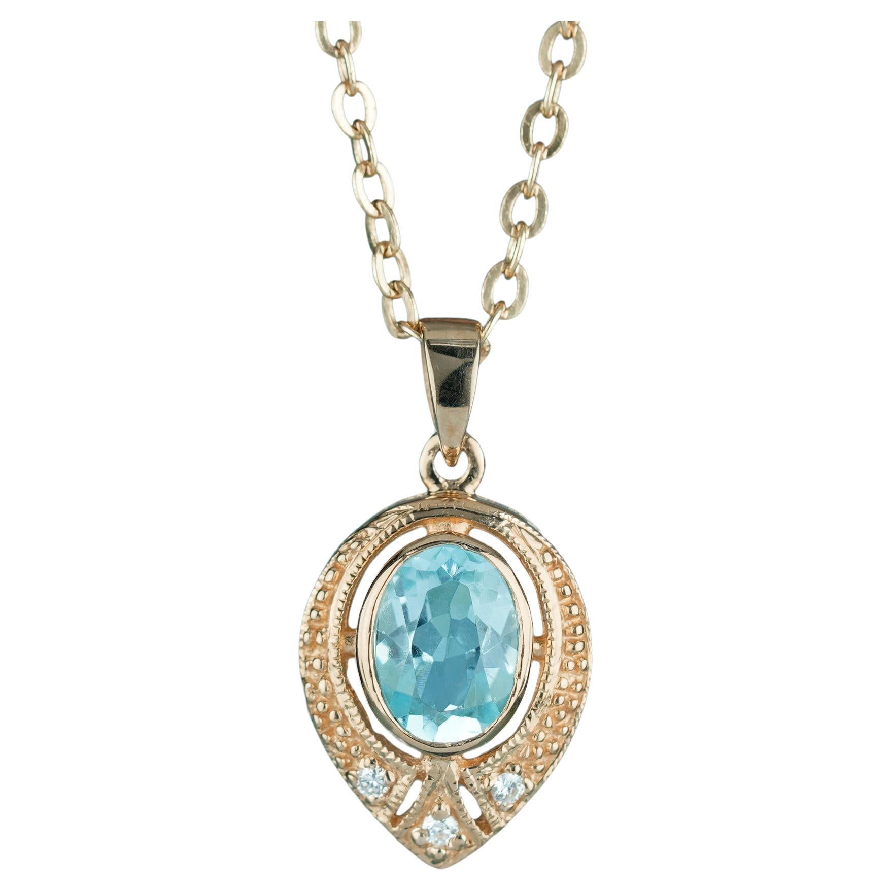 Natural Blue Topaz and Diamond Vintage Style Pendant in solid 9K Yellow Gold For Sale