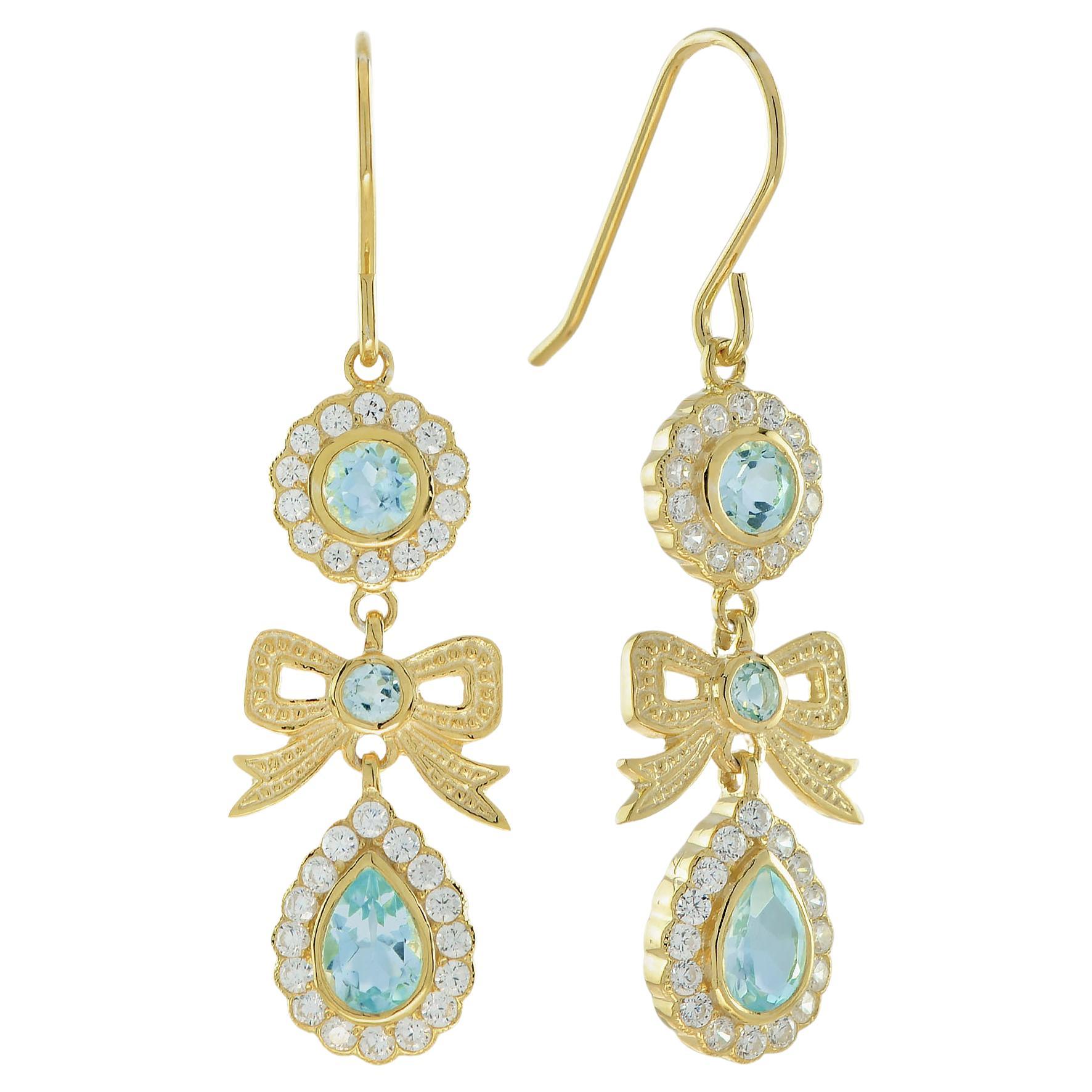 Natural Blue Topaz and Diamond Vintage Style Ribbon Earrings in 9K Yellow Gold