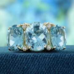 Vintage Three-Stone Ring in 9K Yellow Gold with Blue Topaz & Diamonds