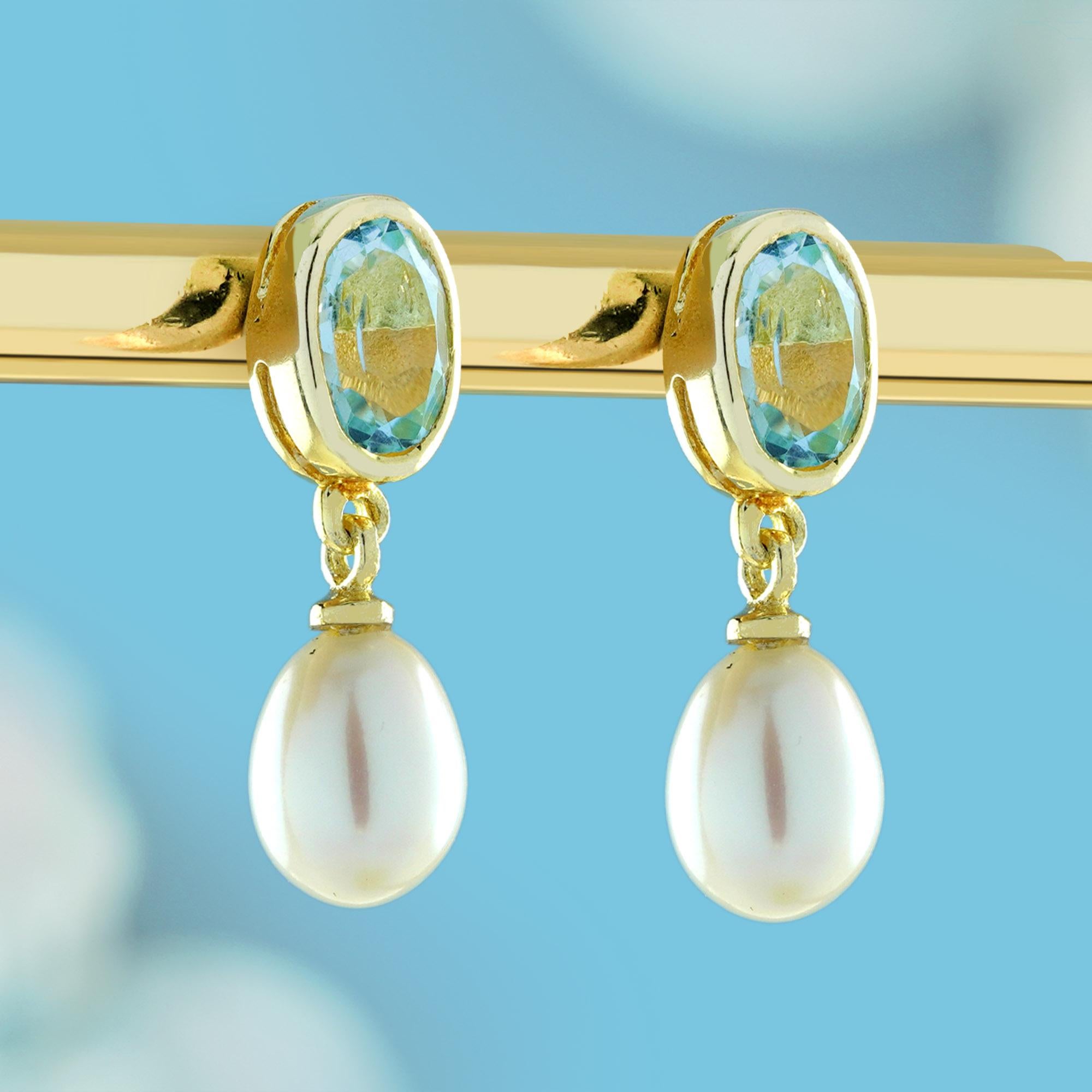 Edoardiano Orecchini pendenti con perle e topazio blu naturale in oro giallo 9 carati in vendita