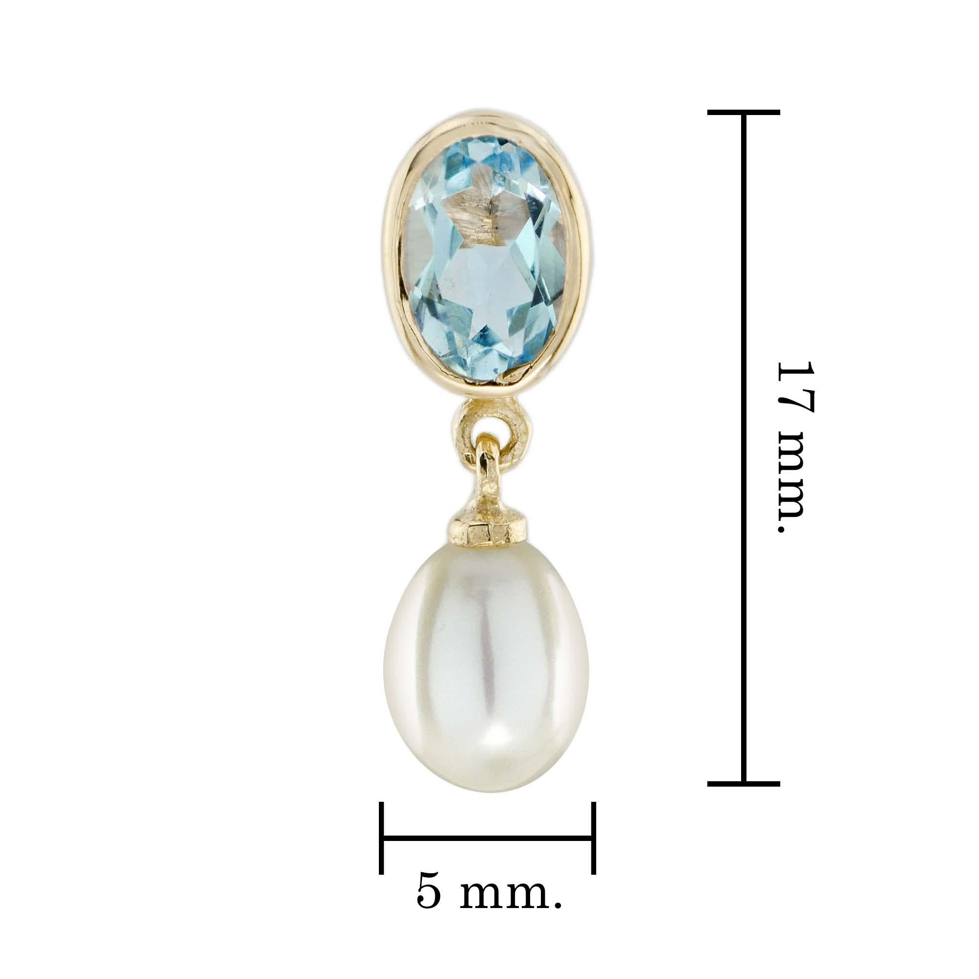 Orecchini pendenti con perle e topazio blu naturale in oro giallo 9 carati In condizioni Nuovo in vendita a Bangkok, TH