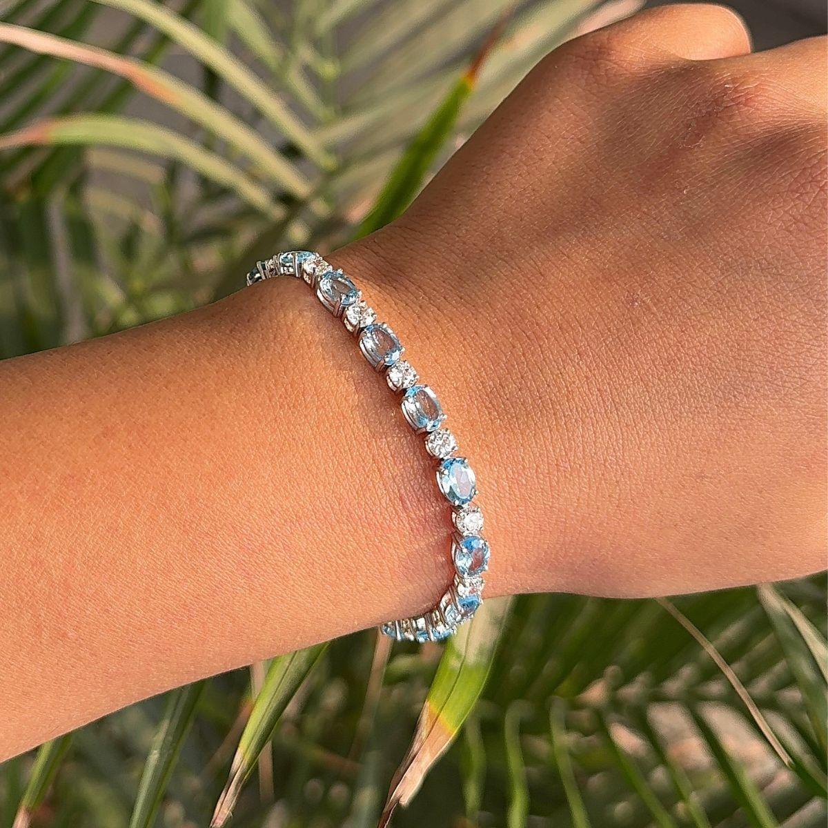 Natural Blue Topaz and Zircon 15.3 Carat Tennis Bracelet in 925 Sterling Silver. You shall need statement tennis bracelet to make a statement with your look. Each piece features dazzling cubic zirconia stones, renowned for their brilliance and