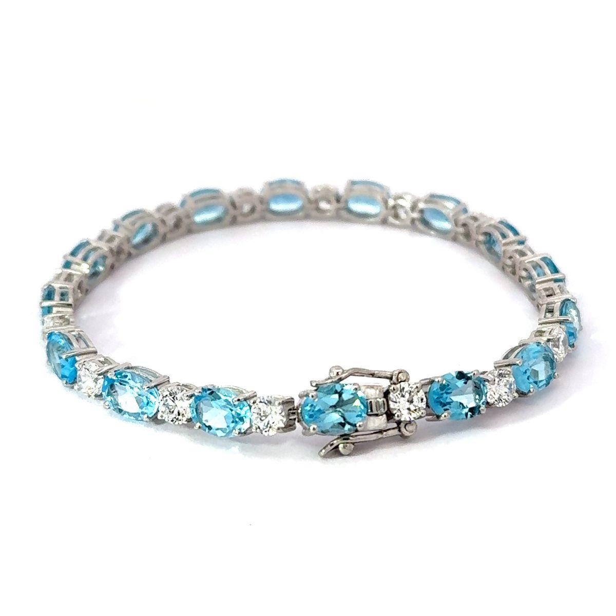Natural Blue Topaz and CZ 15.3 Carat Silver Tennis Bracelet Jewelry Gift for Her In New Condition For Sale In New York, NY