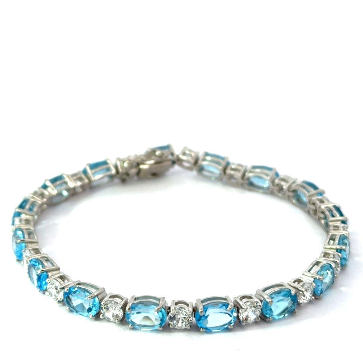 Natural Blue Topaz and CZ 15.3 Carat Silver Tennis Bracelet Jewelry Gift for Her For Sale 1