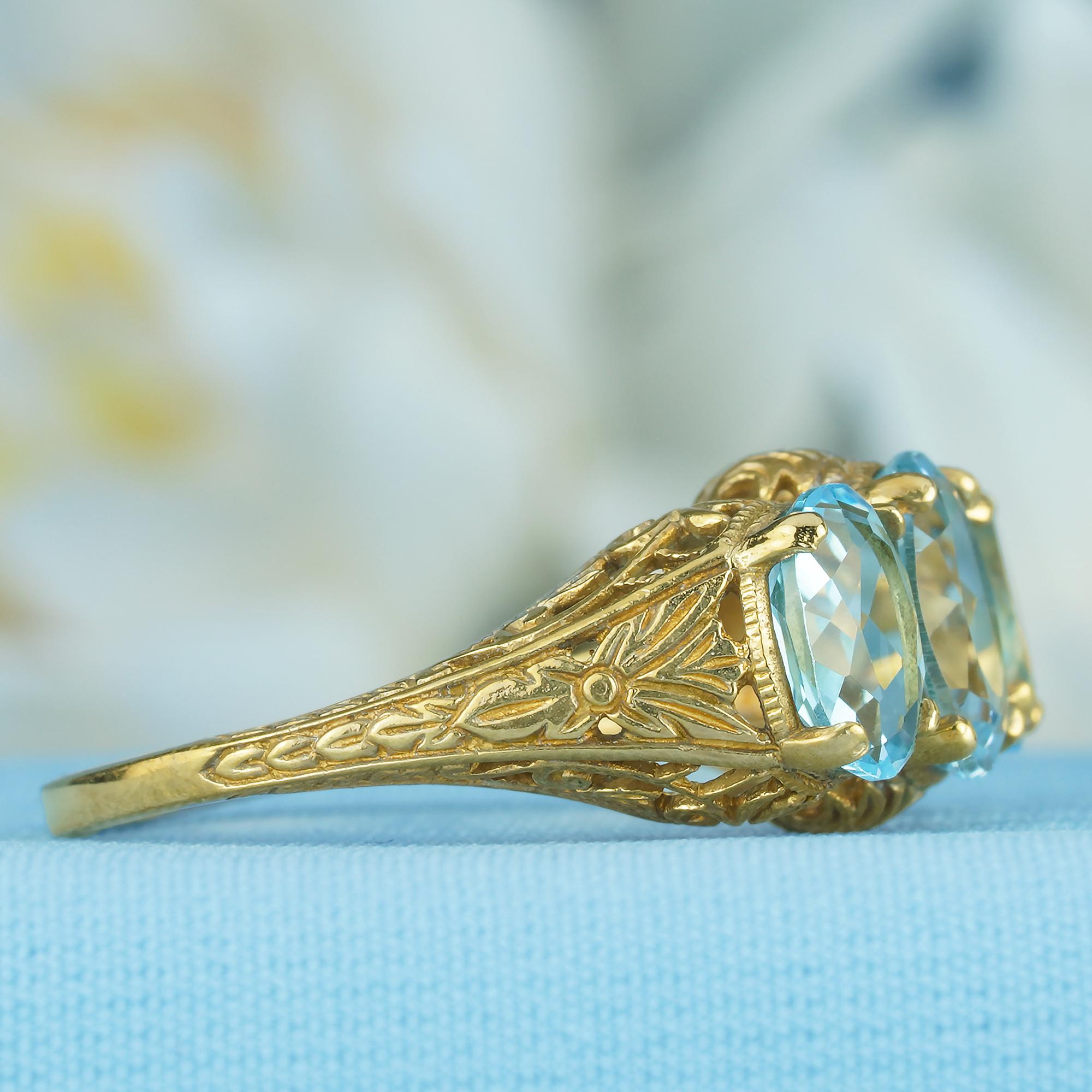 Oval Cut Natural Blue Topaz Art Deco Style Three Stone Filigree Ring in Solid 9K Gold For Sale