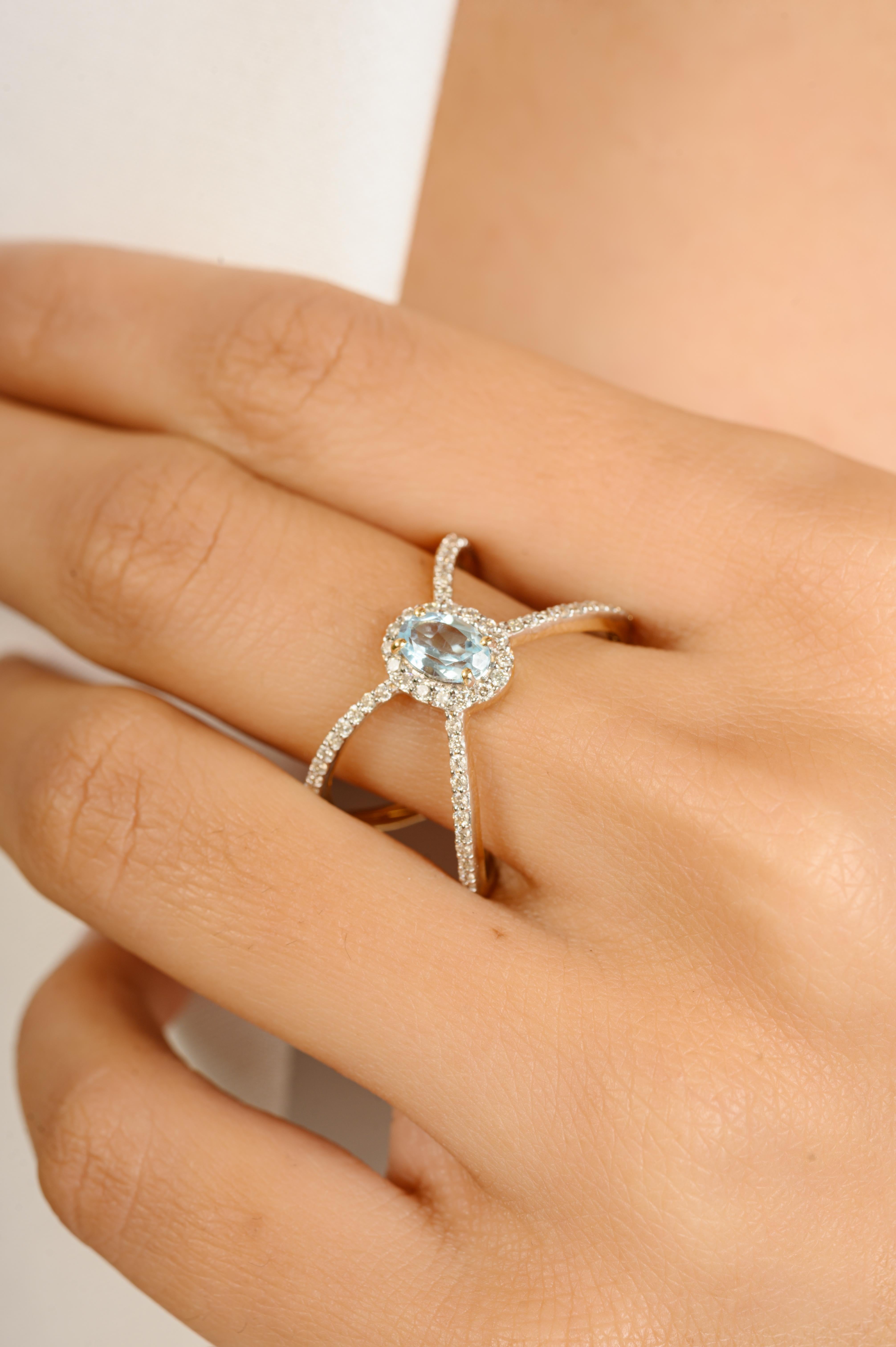En vente :  Bague croisée en or jaune 14 carats avec topaze bleue naturelle et diamants 2