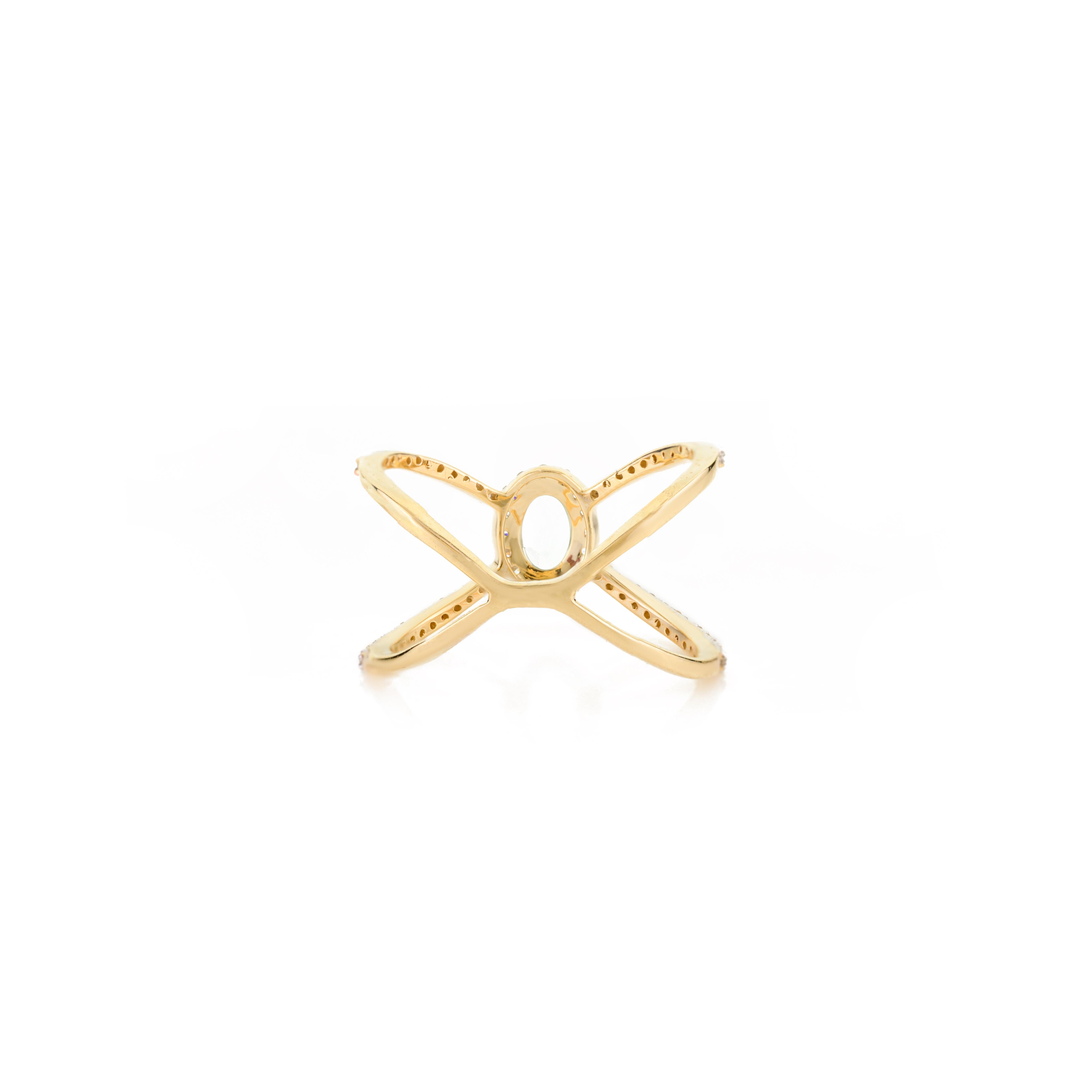 En vente :  Bague croisée en or jaune 14 carats avec topaze bleue naturelle et diamants 6
