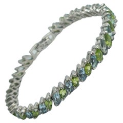Natural Blue Topaz Peridot.925 Sterling Silver Rhodium Plated Tennis Bracelet Natural Blue Topaz Peridot.925 Sterling Silver Rhodium Plated Tennis Bracelet