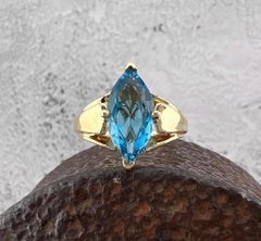 Anillo de Topacio Azul Natural en Oro de 14k
