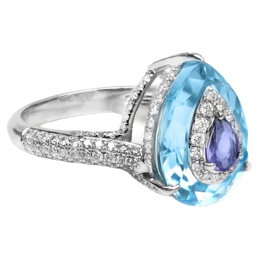 Natural blue topaz tanzanite diamond ring in 18k gold