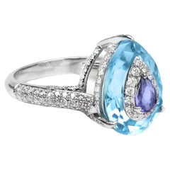 Ring aus 18 Karat Gold mit natürlichem blauem Topas und Tansanit und Diamanten