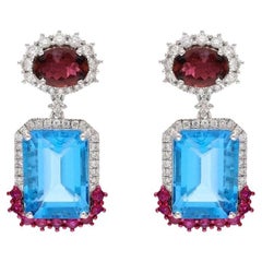 Orecchino con topazio blu naturale, tormalina e diamante in oro 18 carati