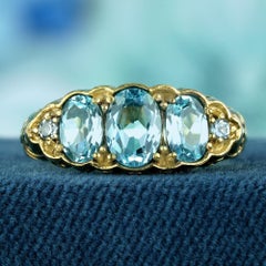 Natural Blue Topaz Vintage Style Carved Three Stone Ring in Solid 9K Yellow Gold