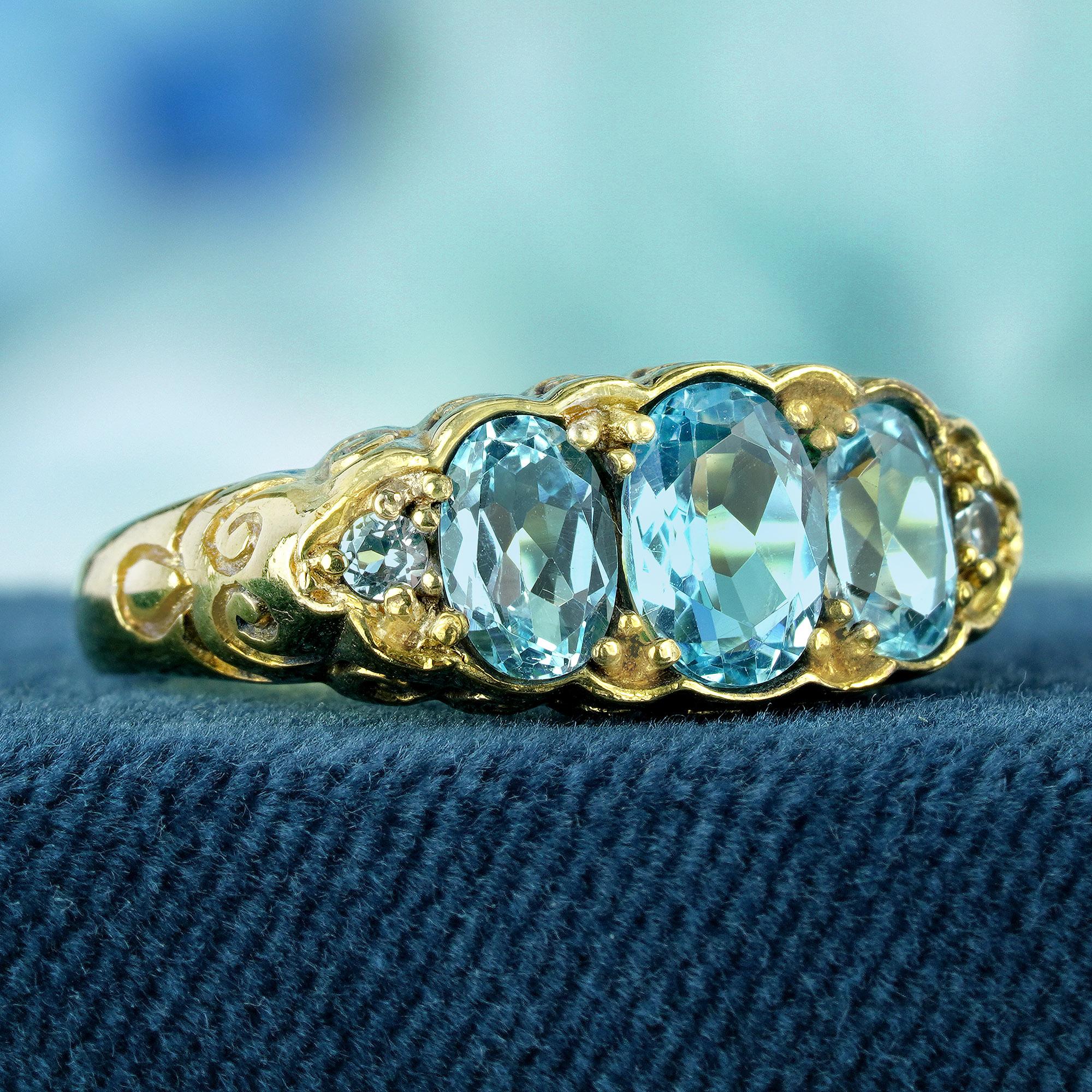 Edwardian Natural Blue Topaz Vintage Style Carved Three Stone Ring in Solid 9K Yellow Gold For Sale