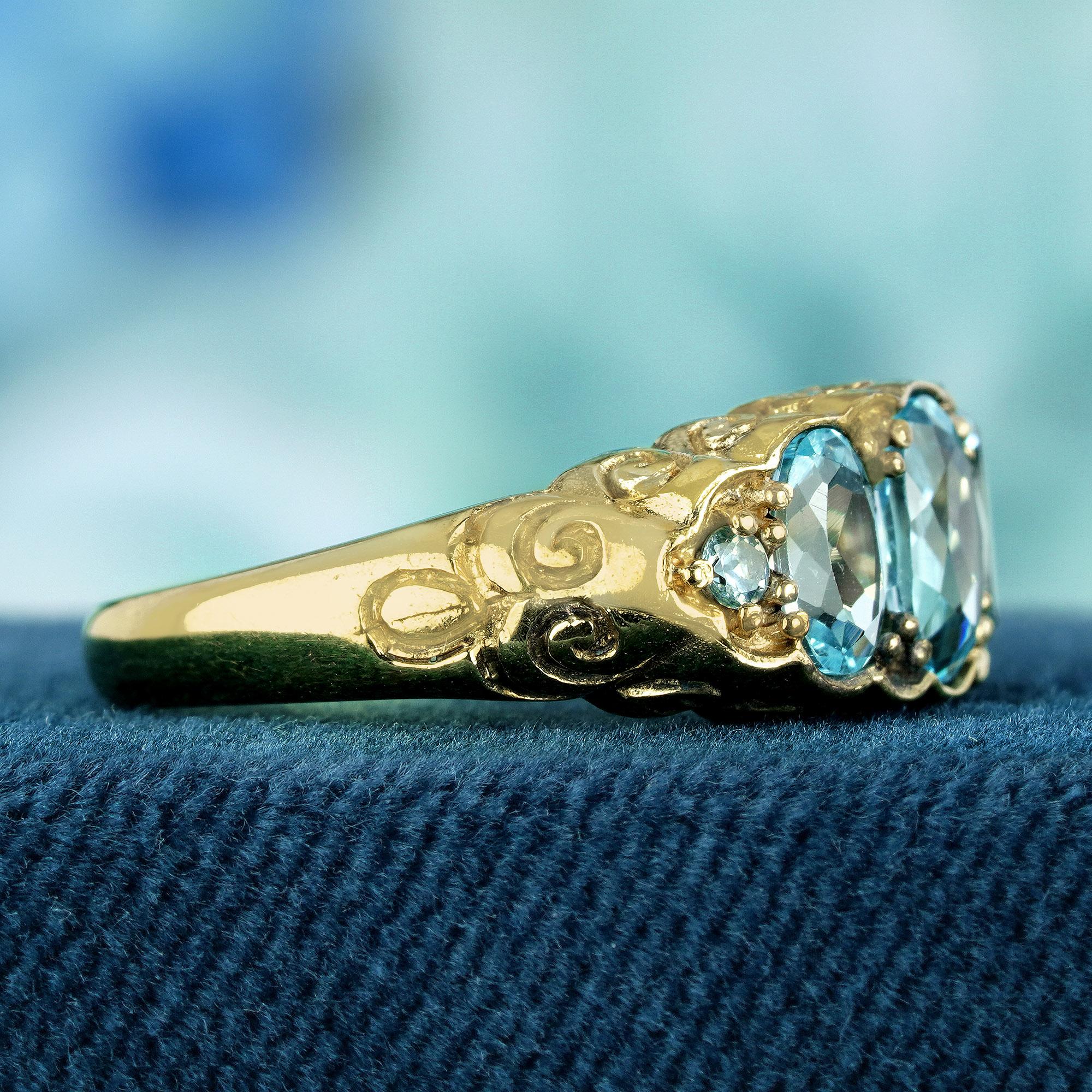 Oval Cut Natural Blue Topaz Vintage Style Carved Three Stone Ring in Solid 9K Yellow Gold For Sale