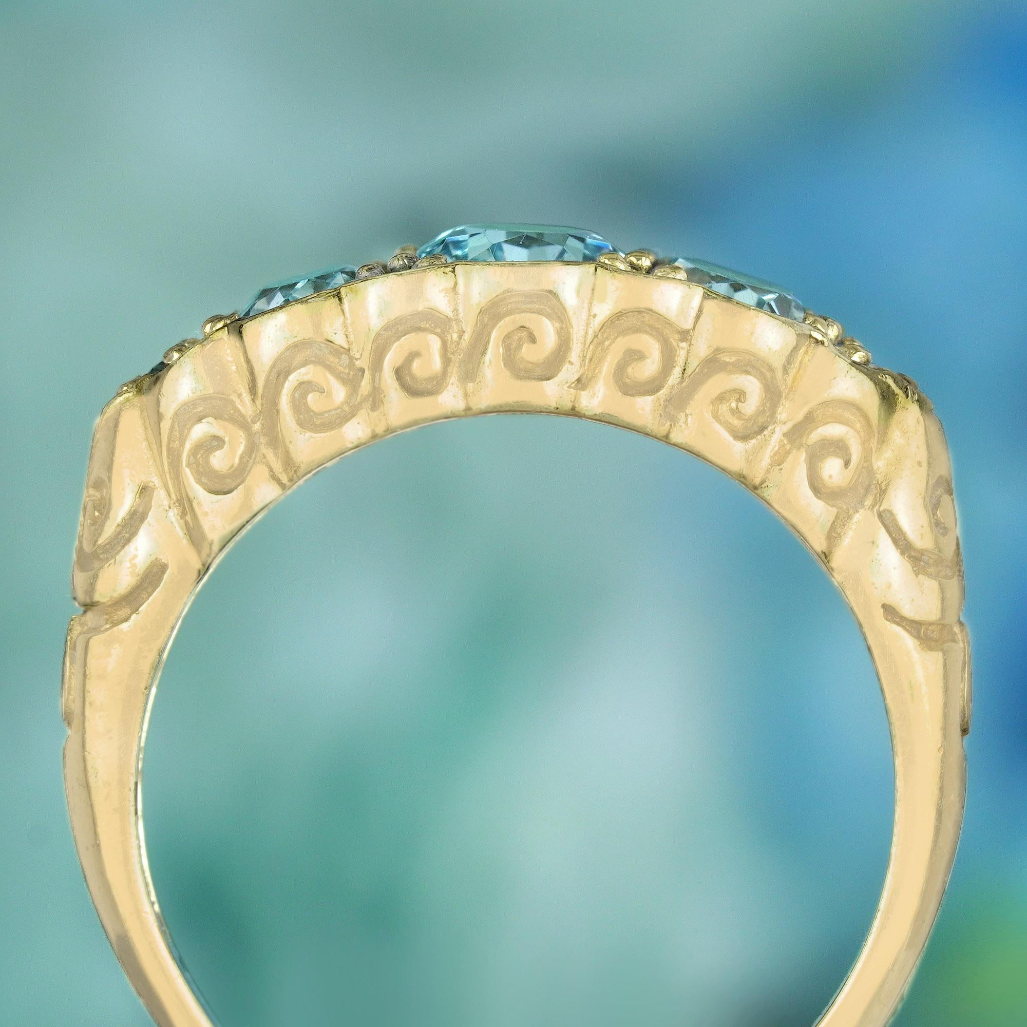 Natural Blue Topaz Vintage Style Carved Three Stone Ring in Solid 9K Yellow Gold In New Condition For Sale In Bangkok, TH
