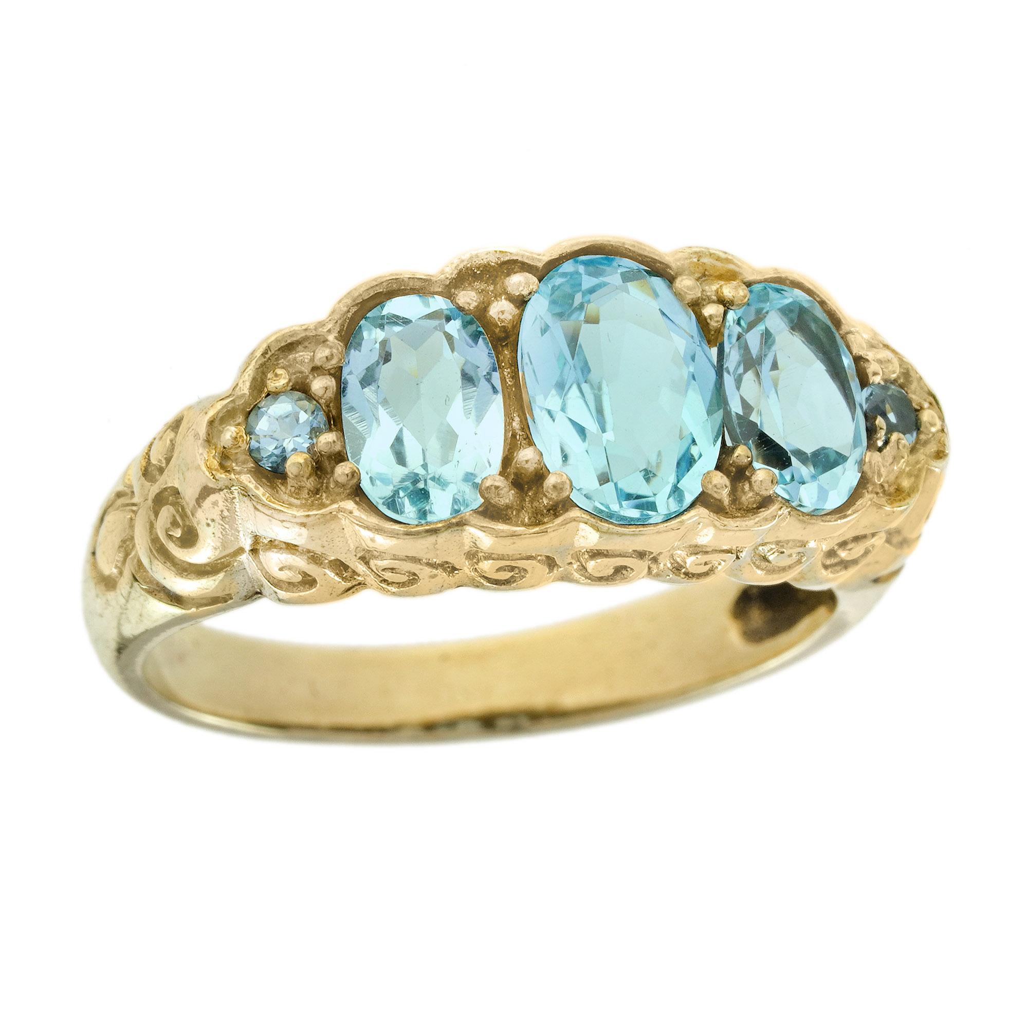 Natural Blue Topaz Vintage Style Carved Three Stone Ring in Solid 9K Yellow Gold For Sale