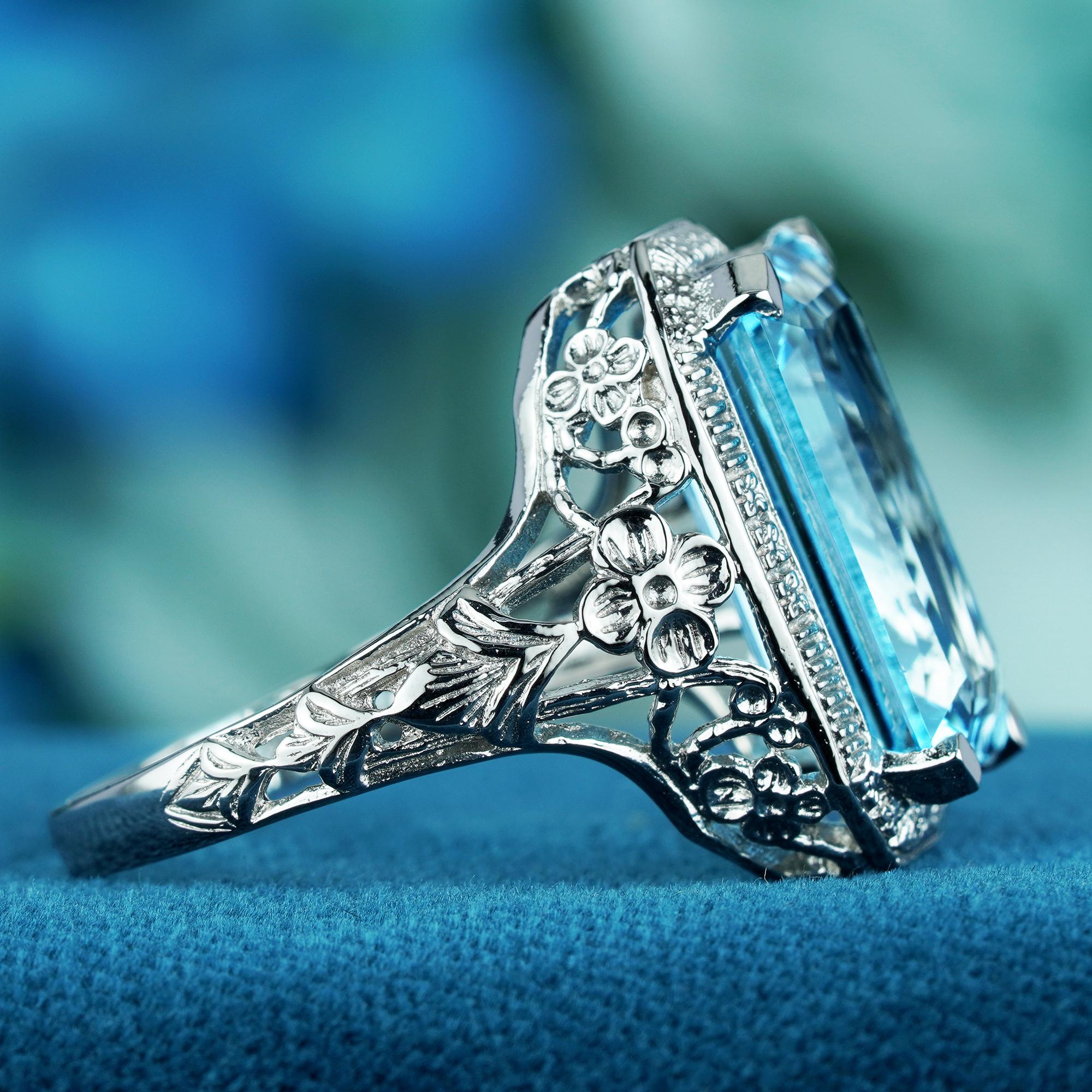 Taille émeraude Bague cocktail de style vintage en or blanc massif 9 carats avec topaze bleue naturelle en vente