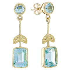 Boucles d'oreilles pendantes de style vintage en or jaune 9K et topaze bleue naturelle