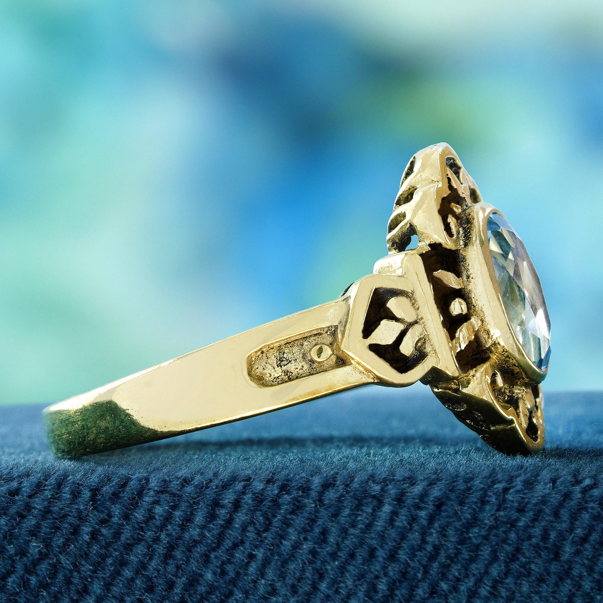 Oval Cut Natural Blue Topaz Vintage Style Engraved Ring in Solid 9K Yellow Gold For Sale