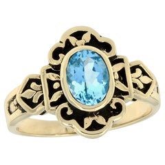 Bague gravée de style vintage en or jaune massif 9 carats avec topaze bleue naturelle