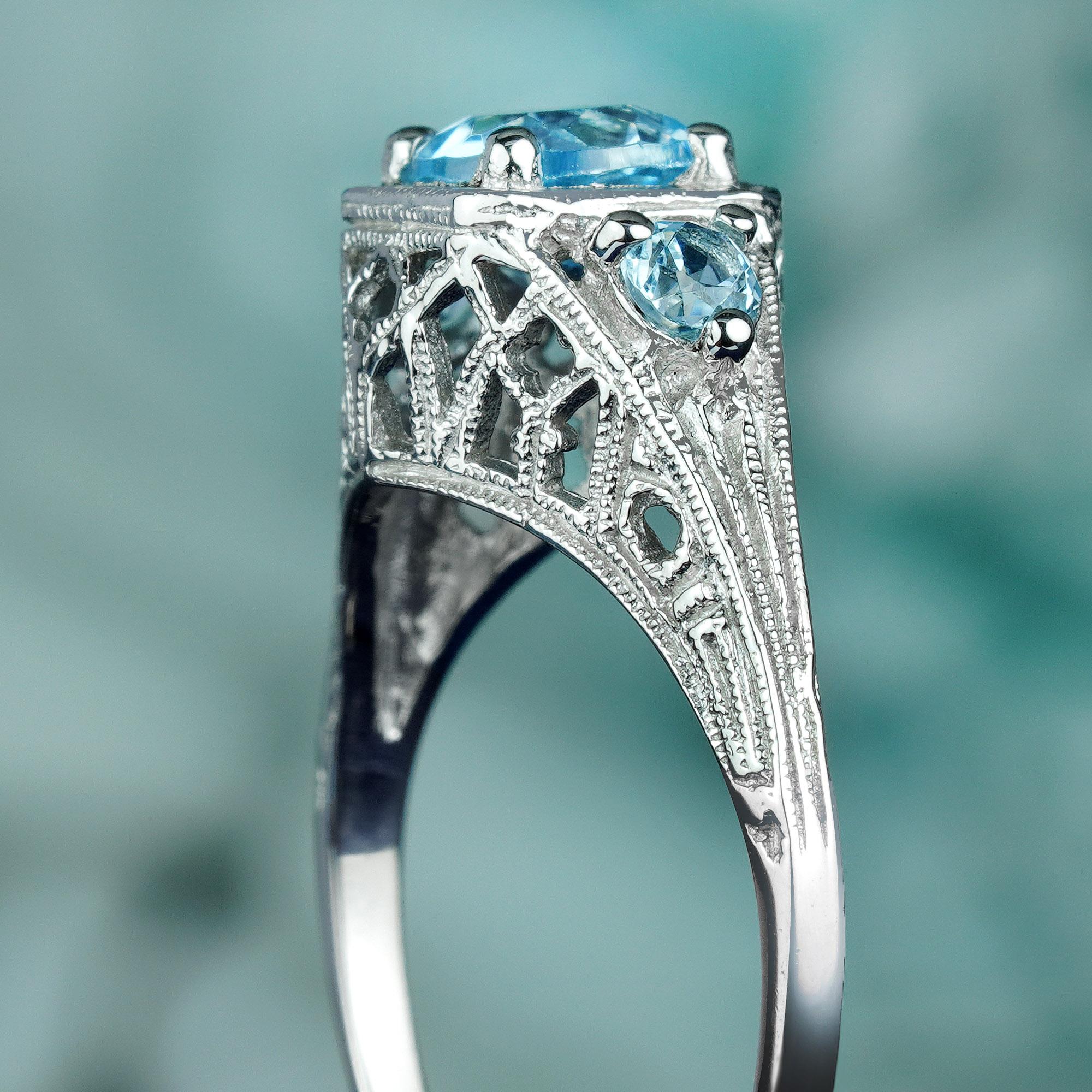 Women's Natural Blue Topaz Vintage Style Filigree Three Stone Ring in Solid 9K Gold For Sale