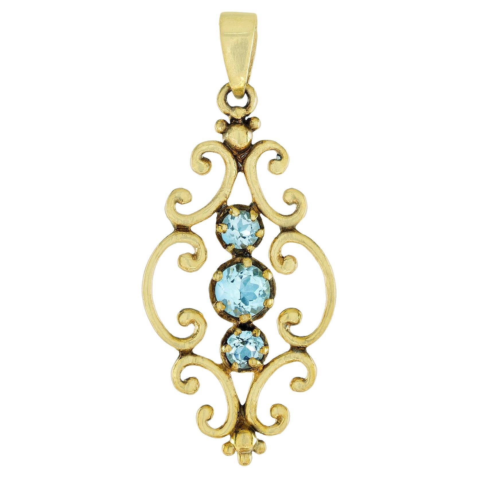 Natural Blue Topaz Vintage Style Three Stone Pendant in Solid 9K Yellow Gold  For Sale