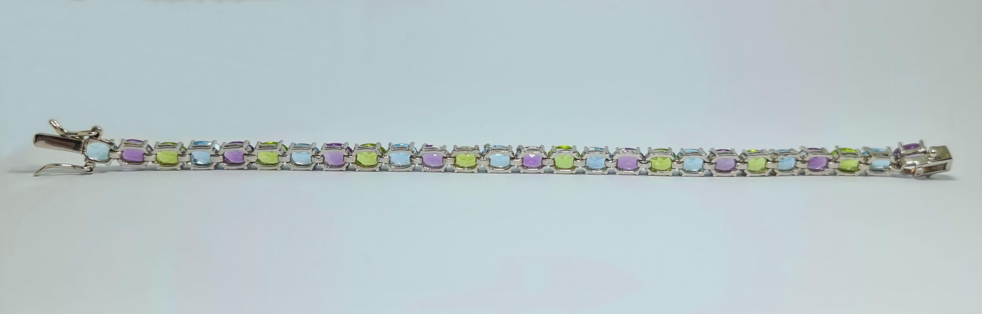 Oval Cut Natural Blue Topaz, Amethyst, Peridot .925 Sterling Silver Rhodium Plate Bracelet For Sale