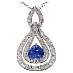 Natural Blue Trilliant Sapphire and White Diamond 1.84 Carat TW Gold Pendant
