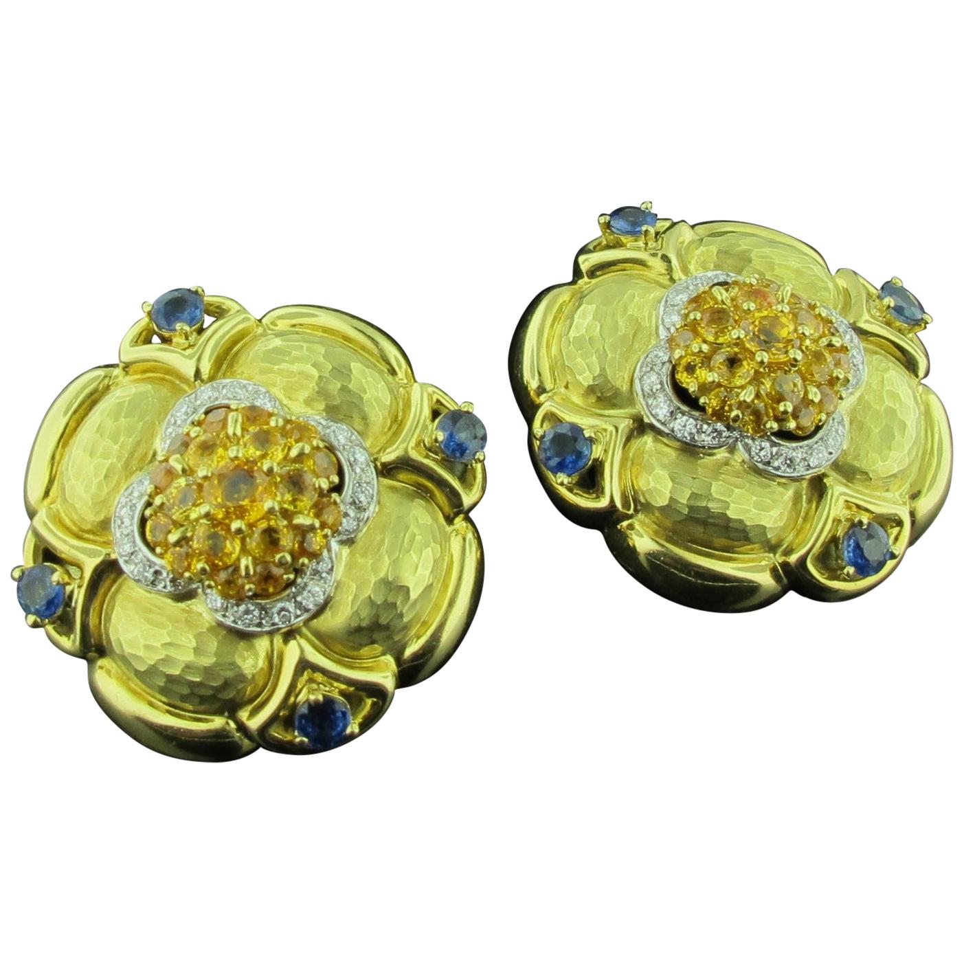 Natural Blue and Yellow Sapphire Earrings Set in 18 Karat Hammered Yellow Gold For Sale
