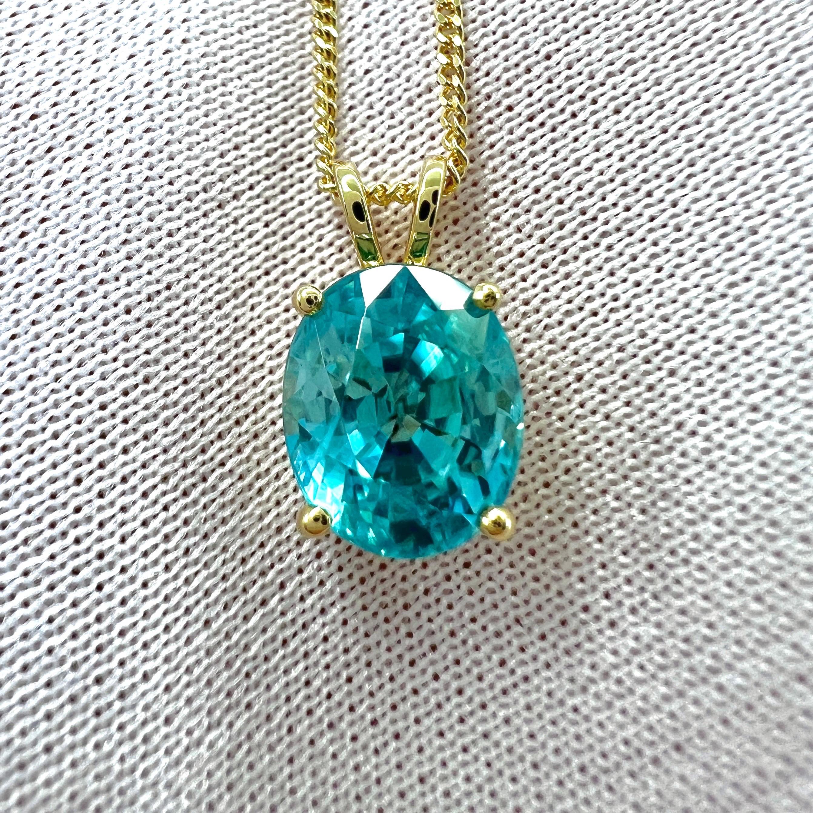 Vivid Neon Blue Oval Cut Natural Zircon 18k Yellow Gold Pendant Necklace.

Stunning 3.78 carat natural blue zircon set in a fine 18k yellow gold solitaire pendant. Stunning blue zircon with a vivid neon blue colour and excellent clarity, very clean