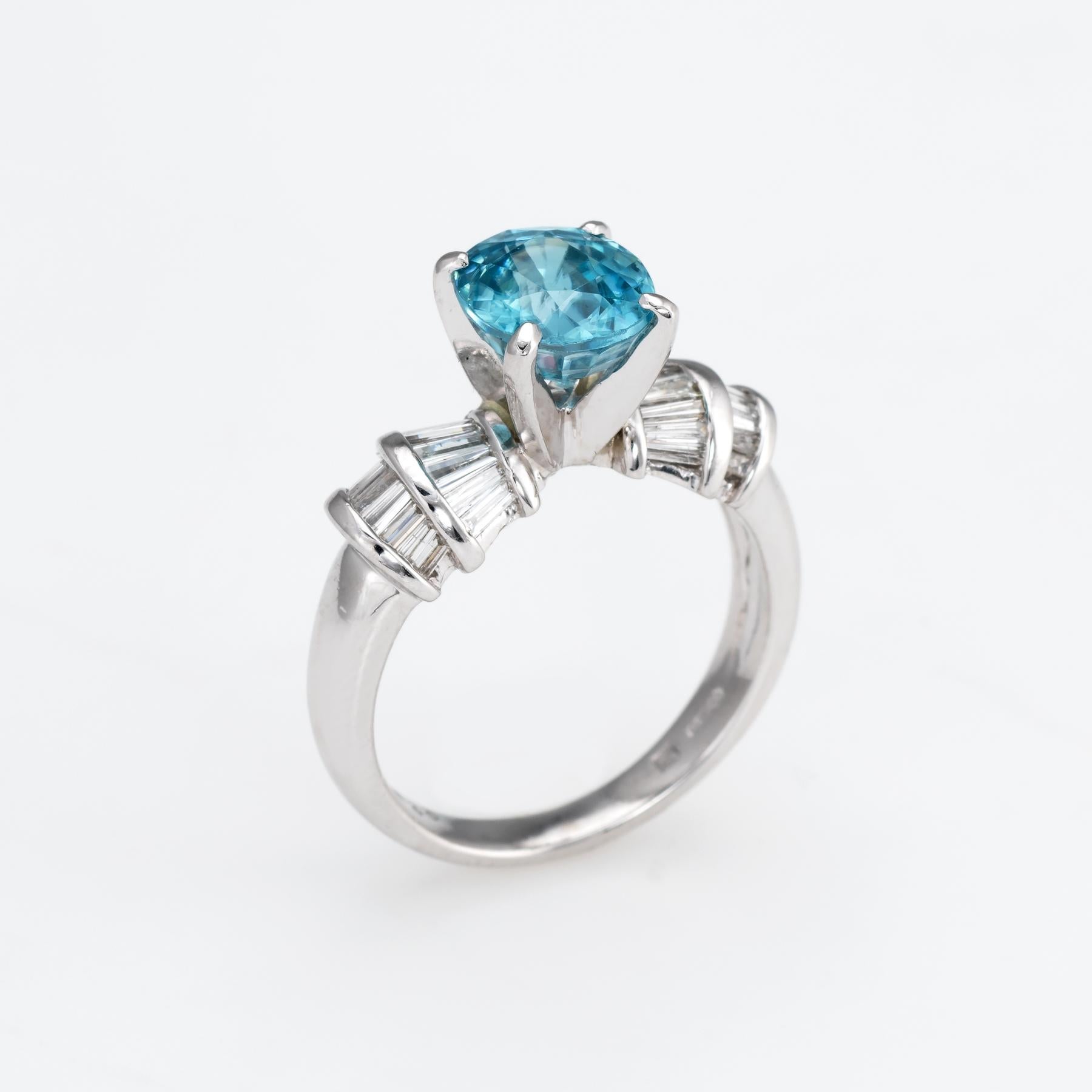 Finely detailed estate blue zircon & diamond ring, crafted in 900 platinum. 

One oval shaped mixed cut Blue Zircon, approx. 2.80 carats (8.67 x 7.55 x 4.85mm), medium blue color, flawless, good cut. Thirty six tapered baguette cut diamonds, total