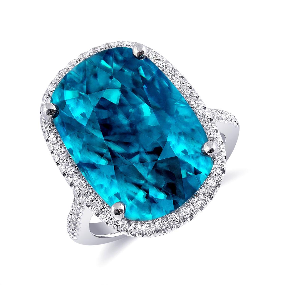 Discover the breathtaking beauty of natural blue zircon with this exquisite 14K white gold ring. Featuring a stunning, vividly colored zircon complemented by sparkling diamonds, this piece showcases exceptional craftsmanship and the striking allure
