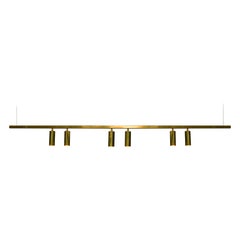 Lampada a sospensione decorativa moderna e contemporanea in ottone naturale realizzata a mano in Italia