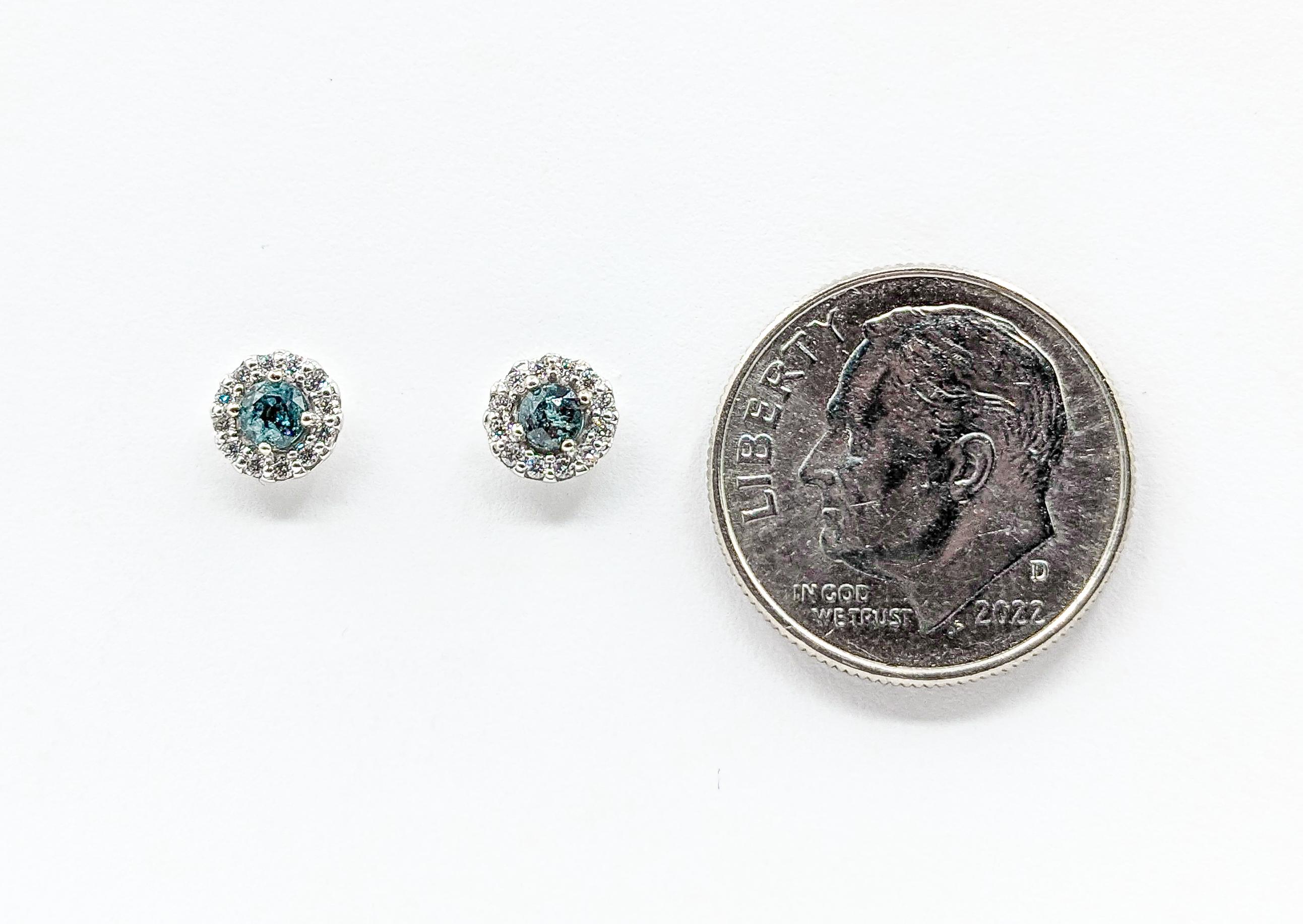 Natural Brazilian Alexandrite & Diamond Halo Stud Earrings in White Gold

Introducing these beautiful alexandrite earrings crafted in 14kw White Gold. These earrings showcase a 0.23ctw of Natural Brazilian Color Change Alexandrite. The alexandrite