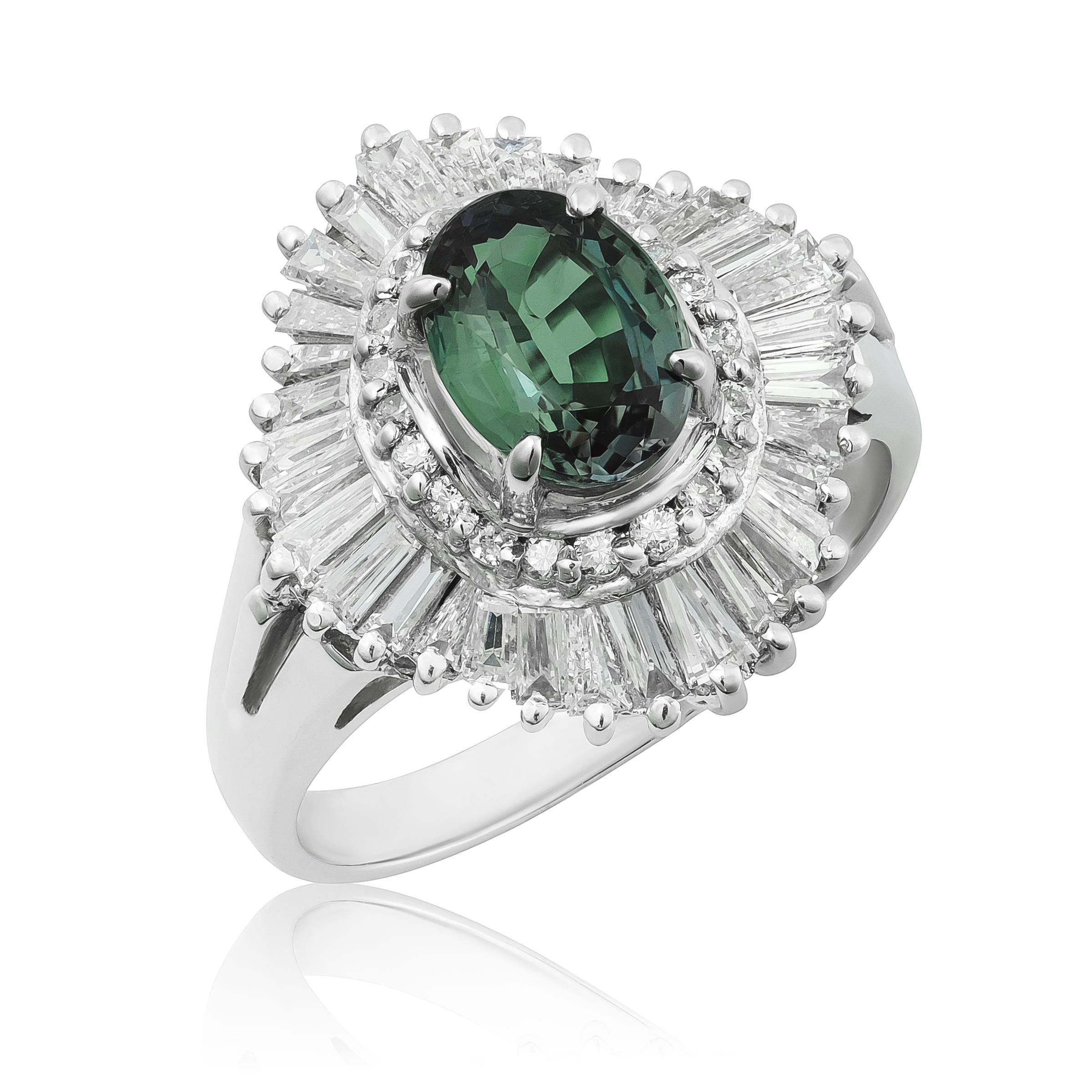 Experience the rare and enchanting beauty of this platinum ring, showcasing a 1.44-carat natural Brazilian alexandrite. Celebrated for its remarkable color-change effect, this gem shifts from green to purplish hues depending on the light, adding a